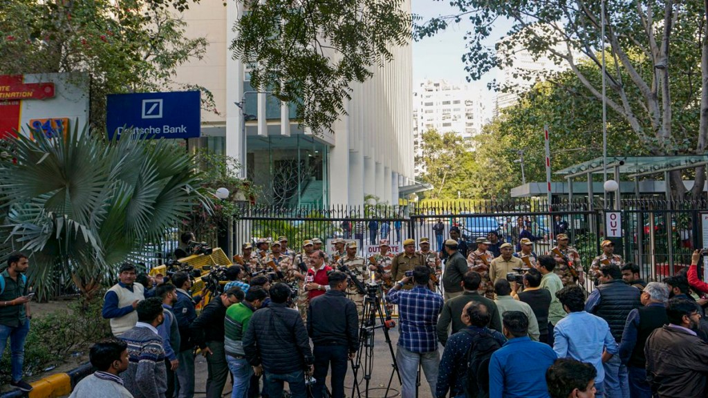 Media personnel outside the BBC office on the second day of Income Tax Department's survey operation, conducted as part of a tax evasion investigation, at KG Marg in New Delhi, Wednesday, Feb. 15, 2023. (PTI Photo)