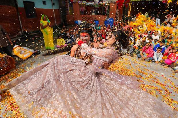 Jammu: Devotees dressed as Lord Shiva and Goddess Parvati perform during 'Maha Shivratri' celebrations, in Jammu. (PTI Photo)