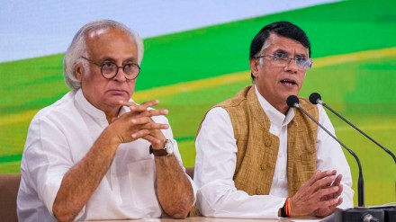 Congress leader Pawan Khera with party leader Jairam Ramesh addresses a press conference at AICC headquarters, in New Delhi, Monday, Feb. 20, 2023. (PTI Photo)
