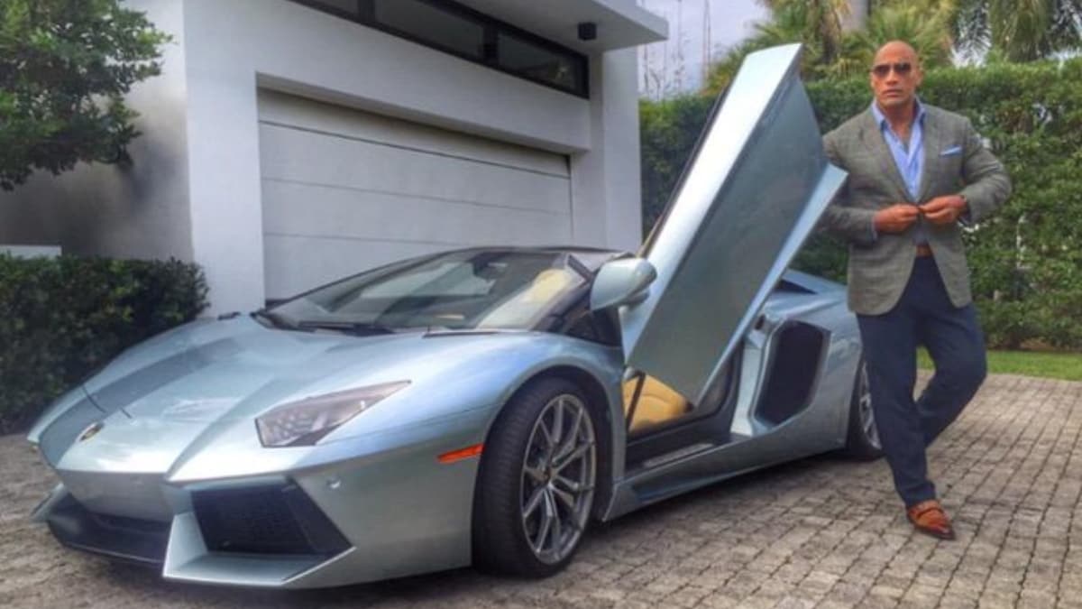 Dwayne Johnson owns two Lamborghinis, a Huracan and an Aventador. The Huracan is powered by the 5.2-litre V10 engine that produces a max power of 527 bhp and a peak torque of 540 Nm. Both cars, combined, are worth more than Rs. 8 crore.