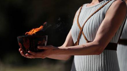 The flame will then be transported overland in a torch relay The flame will then be transported overland in a torch relay