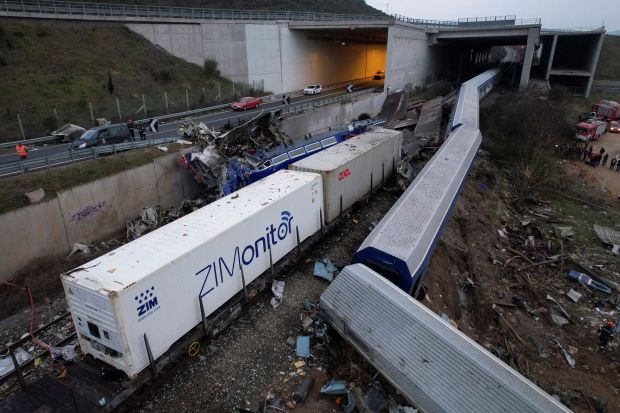 A passenger train and a cargo train collided head-on in Greece on Tuesday night, killing at least 36 people and injuring 85 as the country's deadliest rail crash in decades threw entire carriages off the tracks. (Reuters photo)