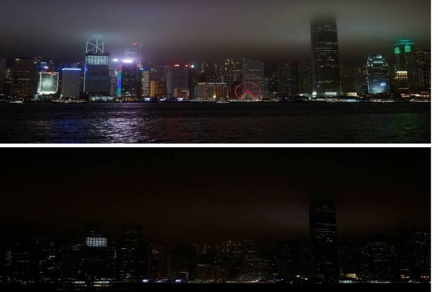 A combination picture shows a view of the Hong Kong's Central financial district before and after lights are switched off to mark Earth Hour, in Hong Kong, China.. REUTERS