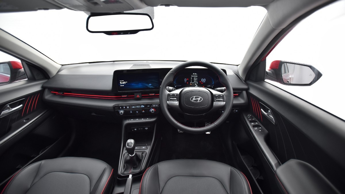 On the inside, it's loaded with features up to the brim. The dashboard boasts a twin-screen layout, one for the digital instrument cluster and the other for the infotainment system. It also gets a wireless charger, an electric sunroof, ambient lighting, and more.