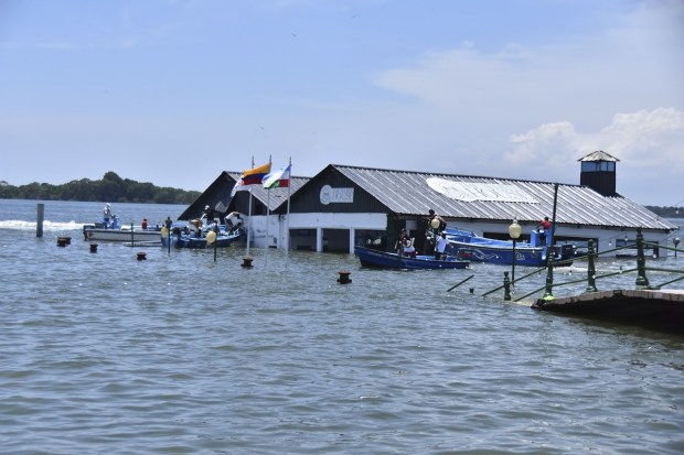The Marine Museum of Puerto Bolivar, detached from the dock, is partially inundated in water after an earthquake that shook Machala, Ecuador. (AP Photo)