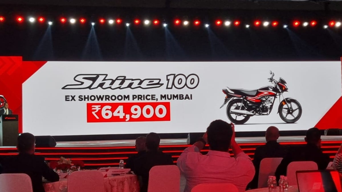 The new Honda Shine 100 is powered by a 99.7cc, single-cylinder, air-cooled, fuel-injected engine that develops 7.6 bhp and 8.05 Nm of peak torque, paired with a 4-speed gearbox. It will rival the Hero HF Deluxe, Splendor, Bajaj Platina, etc.