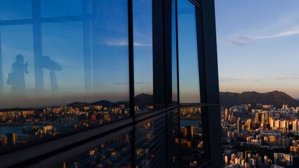 Hong Kong police keep tight tabs on first authorised protest in years