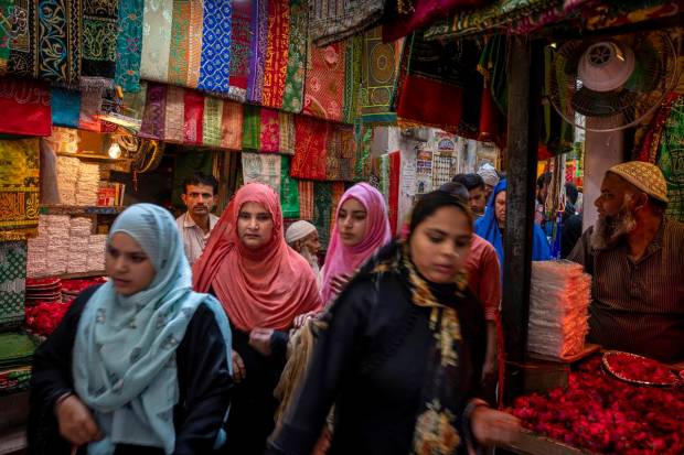 Muslim women visit Nizamuddin Dargah, the burial site of revered Sufi saint Nizamuddin Auliya, ahead of the Islamic holy month of Ramadan in New Delhi, India. (AP Photo)
