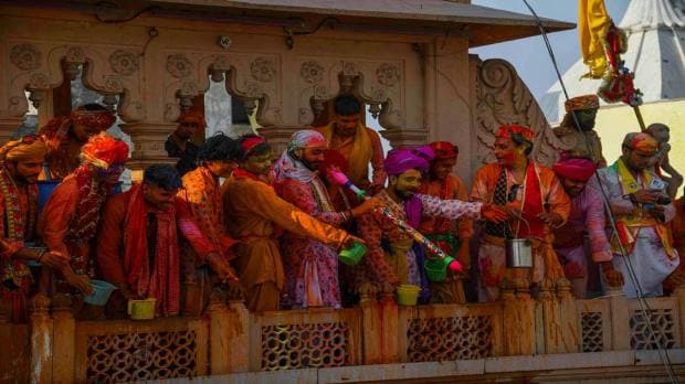 Barsana: People play with colours during traditional 'Lathmar Holi', in Barsana, Tuesday, Feb. 28, 2023. (PTI Photo)