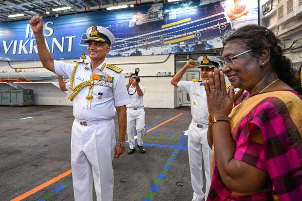 **EDS: IMAGE VIA RB OFFICE** Kochi: President Droupadi Murmu with Chief of the Naval Staff Admiral R. Hari Kumar during a visit to the Indigenous Aircraft Carrier INS Vikrant, in Kochi, Thursday, March 16, 2023. (PTI Photo)(PTI03_16_2023_000202A)