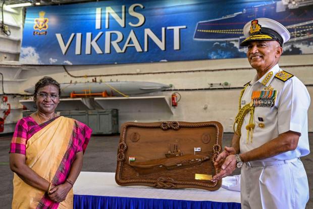 **EDS: IMAGE VIA RB OFFICE** Kochi: President Droupadi Murmu with Chief of the Naval Staff Admiral R. Hari Kumar during a visit to the Indigenous Aircraft Carrier INS Vikrant, in Kochi, Thursday, March 16, 2023. (PTI Photo)(PTI03_16_2023_000204B)