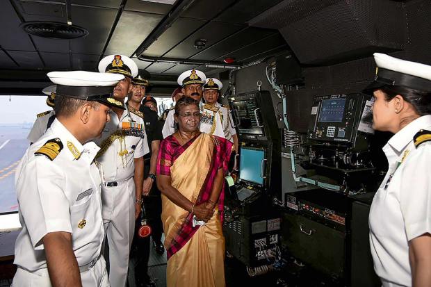 **EDS: IMAGE VIA RB OFFICE** Kochi: President Droupadi Murmu interacts with sailors during a visit to the Indigenous Aircraft Carrier INS Vikrant, in Kochi, Thursday, March 16, 2023. (PTI Photo) (PTI03_16_2023_000268B)
