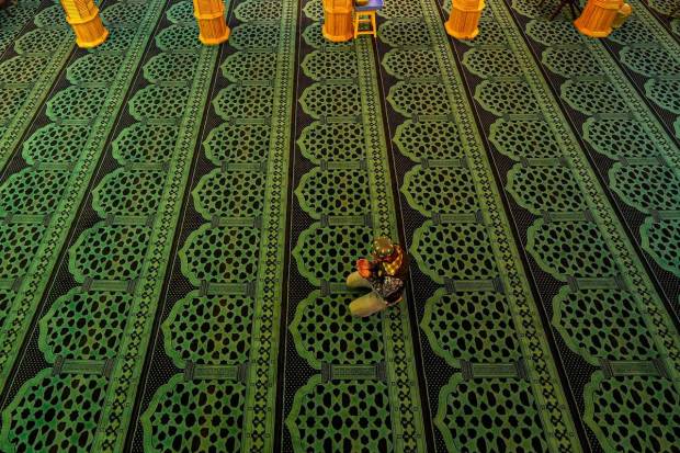 Srinagar: A Muslim man offers prayers in Srinagar. Muslims throughout the world observe fast from dawn till dusk during this holy month of the Islamic calendar. (PTI)