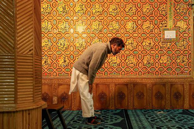 Srinagar: A Muslim man offers prayers in Srinagar. (PTI Photo)