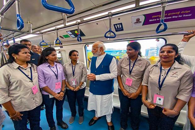  Prime Minister Narendra Modi takes metro ride, in Bengaluru, Saturday, March 25, 2023. (PTI Photo)