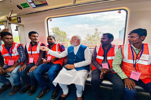  Prime Minister Narendra Modi takes metro ride, in Bengaluru, Saturday, March 25, 2023. (PTI Photo)