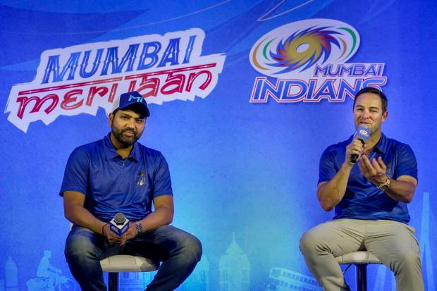 Mumbai: Mumbai Indians' head coach Mark Boucher speaks as the team's captain Rohit Sharma looks on during a press conference ahead of IPL 2023, in Mumbai. (PTI Photo)