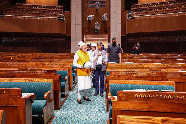 During his visit, he interacted with workers and inspected the facility. He was accompanied by Om Birla, the Speaker of the Lok Sabha, and Manoj Joshi, the Urban Affairs Secretary. (PTI Photo)