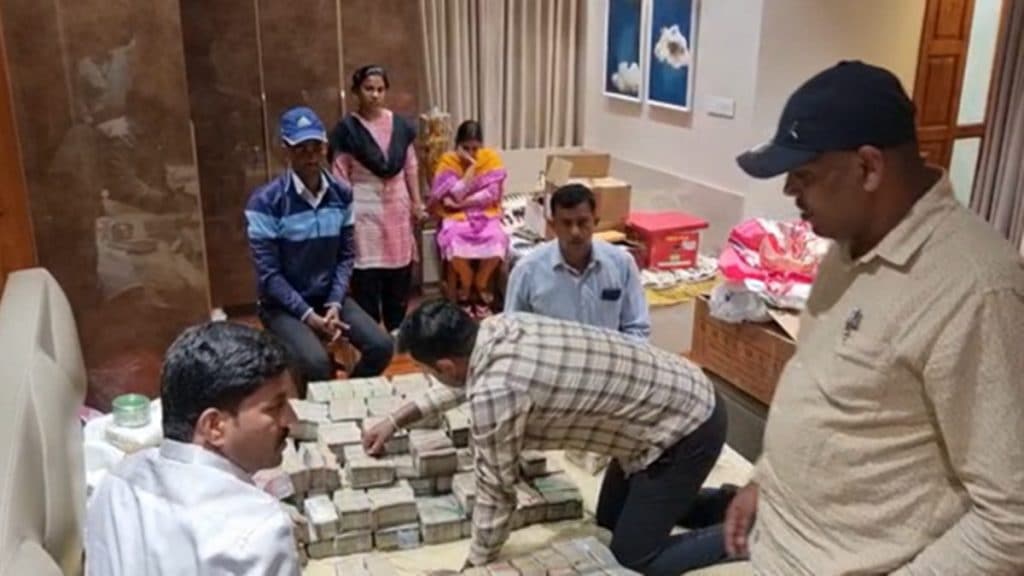 During the raid, Rs 1.2 crore was recovered from the MLAs office where his son was caught. (Express Photo)