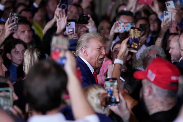 Former President Donald Trump arrives to speak at his Mar-a-Lago estate hours after being arraigned in New York City, in Palm Beach, Fla. (AP Photo)