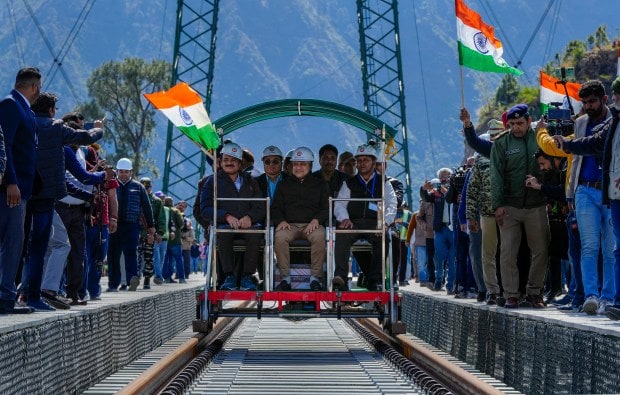 Railway Minister Ashwini Vaishnaw inspects the Chenab Bridge, in Reasi district on March 26, 2023. (PTI photo)