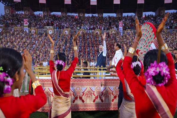 Guwahati: Prime Minister Narendra Modi with the Assam Chief Minister Himanta Biswa Sarma during the mega Bihu dance program, in Guwahati. (PTI Photo)