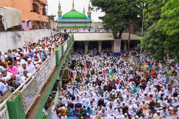 Jabalpur: Muslim devotees offer prayers during the Eid al-Fitr festival, which marks the end of the holy fasting month of Ramadan, at Ranital Eidgah in Jabalpur. (PTI Photo)