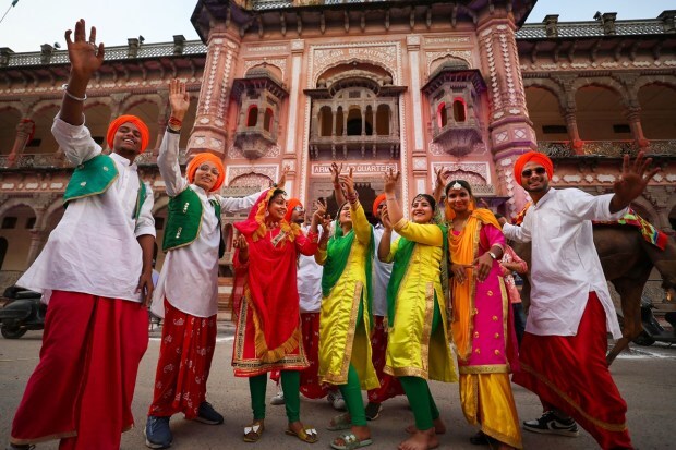 Artists perform during a cultural programme celebrating the festival of 'Baisakhi', in Jammu. (Photo: PTI)