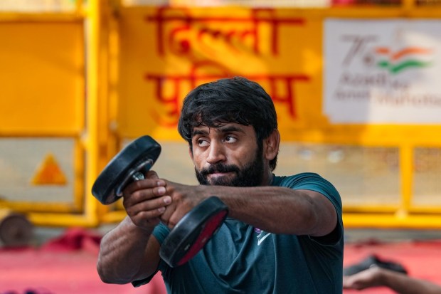 Wrestler Bajrang Punia exercises near Jantar Mantar during a protest, in New Delhi, on Thursday. (Photo: PTI)
