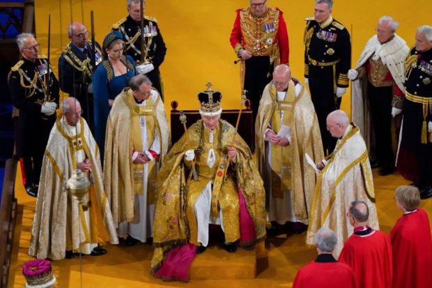 King Charles III receives The St Edward's Crown during his coronation ceremony at Westminster Abbey, London.