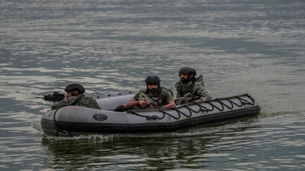 Marine Commandos of Indian Navy, patrol the Dal Lake ahead of the G20 meetings. Authorities have tightened security in Srinagar and rest of the Union Territory, (PTI Photo)