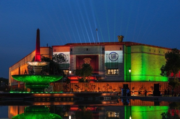 The triangular-shaped four-storey building has a built-up area of 64,500 square metres. The building has three main gates -- Gyan Dwar, Shakti Dwar, and Karma Dwar. (PTI photo)