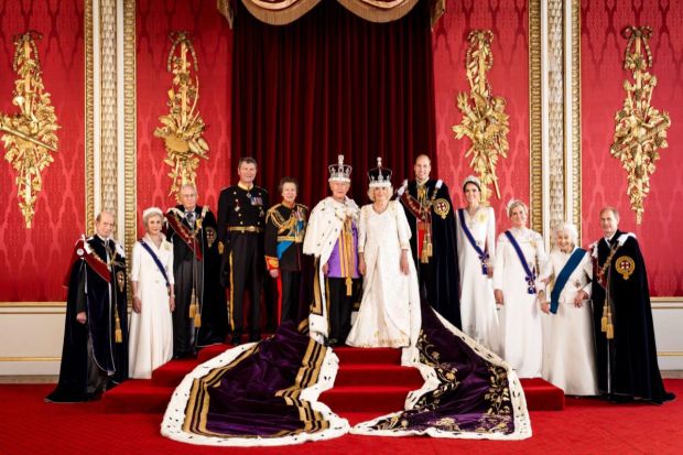 In this photo made available by Buckingham Palace on Monday, May 8, 2023, Britain's King Charles III and Queen Camilla are pictured with members of the working royal family, from left Prince Edward, the Duke of Kent, Birgitte, Duchess of Gloucester, Prince Richard, the Duke of Gloucester, Vice Admiral Sir Tim Laurence, Princess Anne, Prince William, the Prince of Wales, Kate, the Princess of Wales, Sophie, the Duchess of Edinburgh, Princess Alexandra, the Hon. Lady Ogilvy and Prince Edward, the Duke of Edinburgh, in the Throne Room at Buckingham Palace.