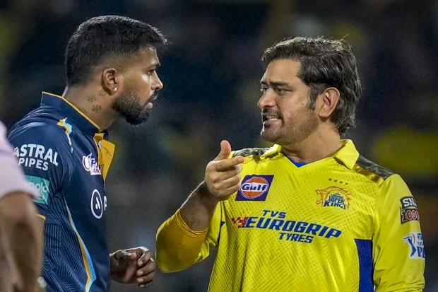 Gujarat Titans captain Hardik Pandya with Chennai Super Kings captain MS Dhoni before the start of the IPL 2023 first qualifier cricket match. (PTI Photo)