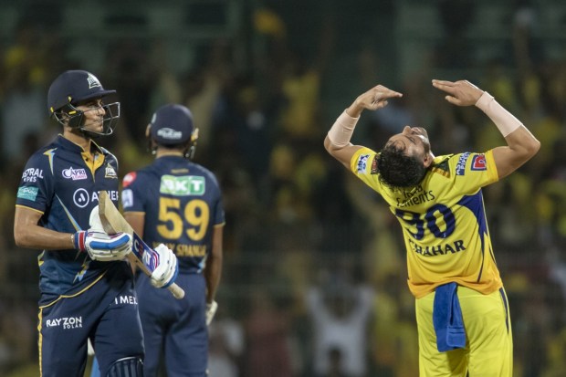 Chennai Super Kings' Deepak Chahar celebrates the wicket of Gujrat Titans' Shubman Gill, left, during the Indian Premier League qualifier cricket match. (AP Photo)