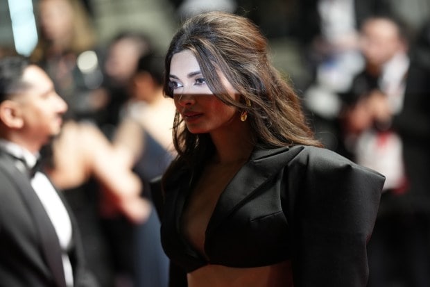 Diana Penty poses for photographers upon arrival for the premiere of the film 'May December' at the 76th international film festival.(AP Photo)