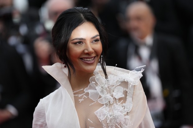 Esha Gupta poses for photographers upon arrival at the opening ceremony and the premiere of the film 'Jeanne du Barry' at the 76th international film festival, Cannes, southern France. (AP Photo)
