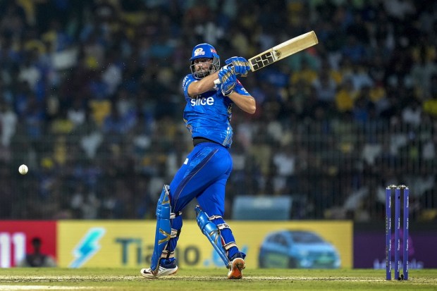 Mumbai Indians batter Tim David plays a shot during the IPL 2023 Eliminator cricket match between Lucknow Super Giants and Mumbai Indians, at M. A. Chidambaram Stadium in Chennai, Wednesday, May 24, 2023. (PTI Photo)