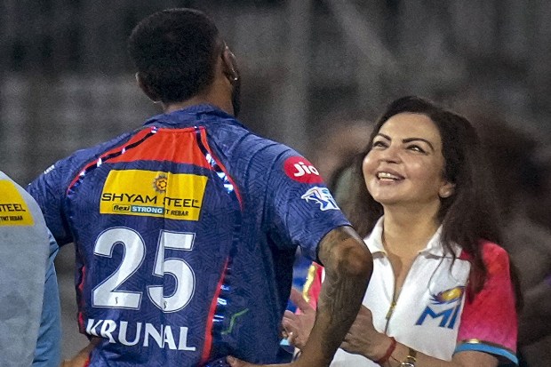 Mumbai Indians owner Nita Mukesh Ambani with Lucknow Super Giants captain Krunal Pandya after Mumbai Indians won the IPL 2023 Eliminator cricket match. (PTI Photo)