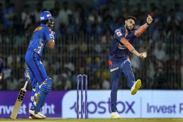 Lucknow Super Giants' Naveen-ul-Haq bowls during the IPL 2023 Eliminator cricket match between Lucknow Super Giants and Mumbai Indians. (PTI Photo)