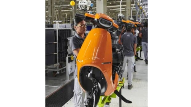 An employee working on the Ola S1 e-scooter. Image courtesy/Ola Electric