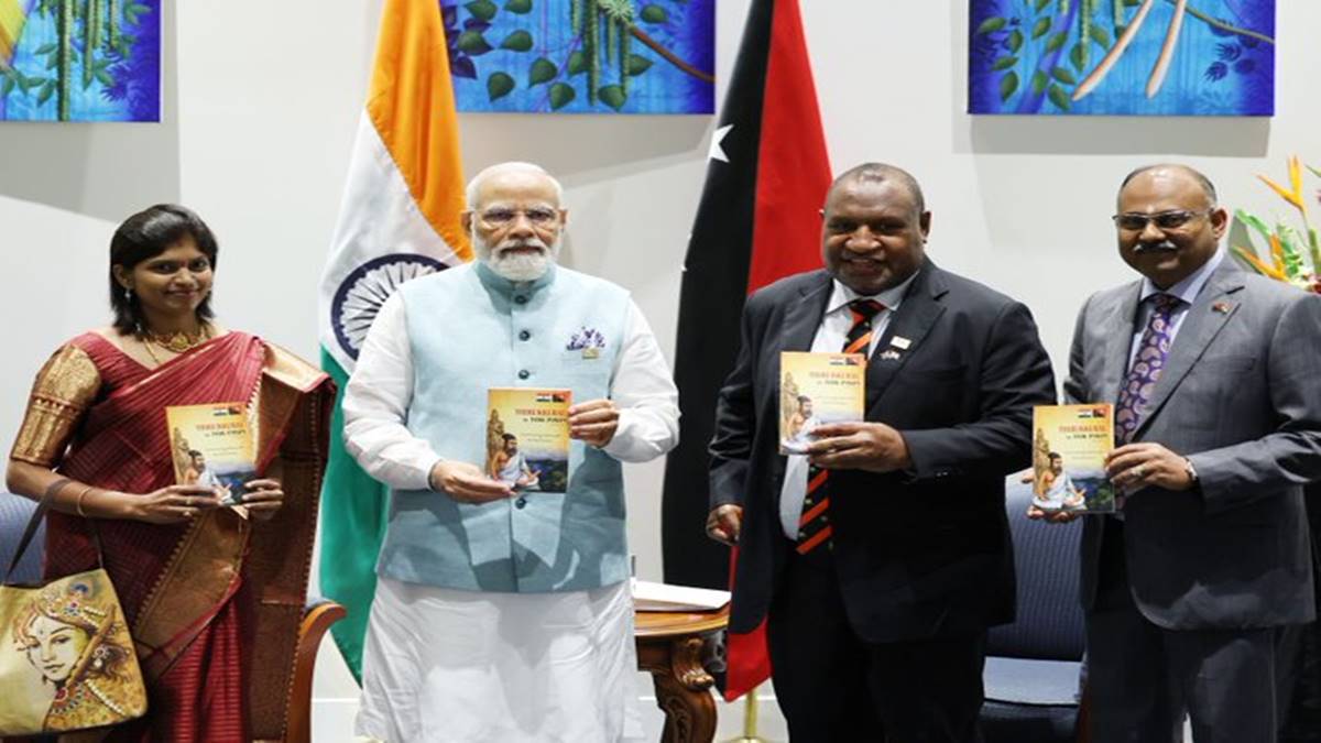PM Modi with Tamil classic Thirukkural PM Modi with Tamil classic Thirukkural