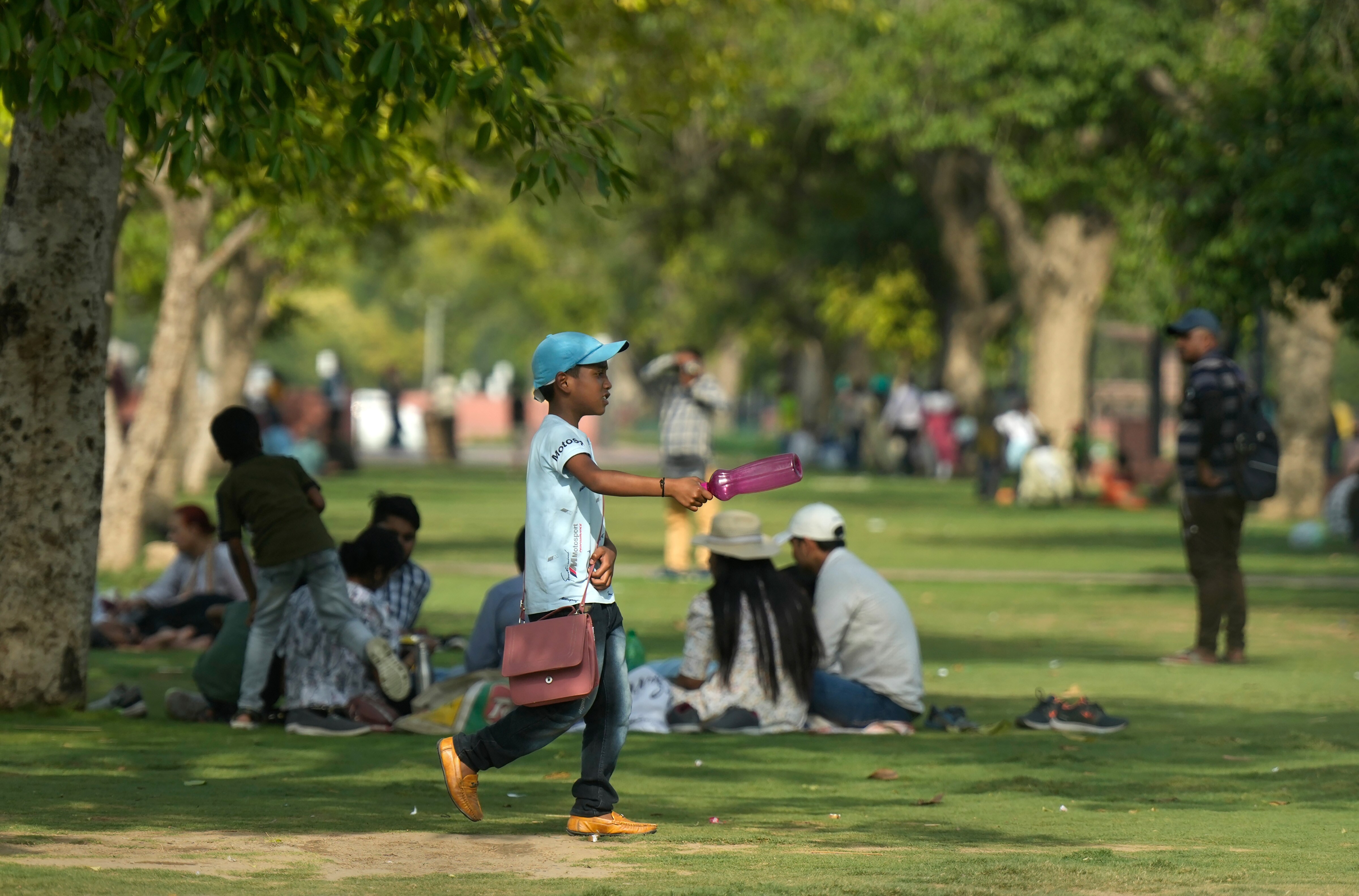 There was less traffic on the roads in the afternoon and the usually crowded boulevards wore a deserted look. (PTI photo)