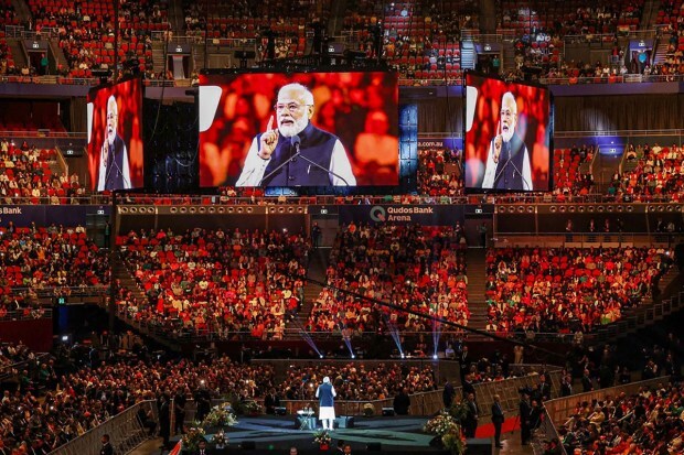 Prime Minister Narendra Modi addresses the Indian community programme in Sydney. (Image/PTI)