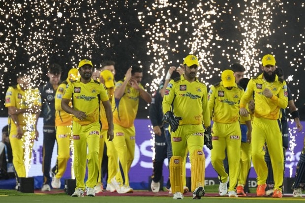 Chennai Super Kings' captain MS Dhoni, third right, leads his team into the field for the Indian Premier League final cricket match against Gujarat Titans in Ahmedabad, India, Monday, May 29, 2023. (Image: AP Photo)