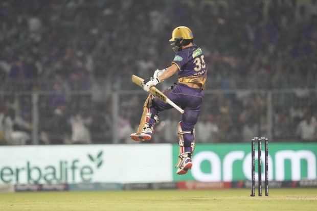Kolkata Knight Riders' Rinku Singh celebrates after scoring the wining boundary against Punjab Kings during an Indian Premier League cricket match in Kolkata. (Photo: AP)