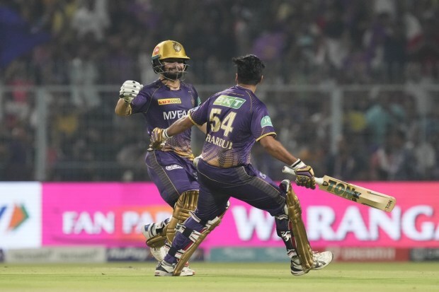 Kolkata Knight Riders' Rinku Singh celebrates after scoring the winning boundary with his teammates Shardul Thakur against Punjab Kings during an Indian Premier League cricket match in Kolkata. (Photo: AP)