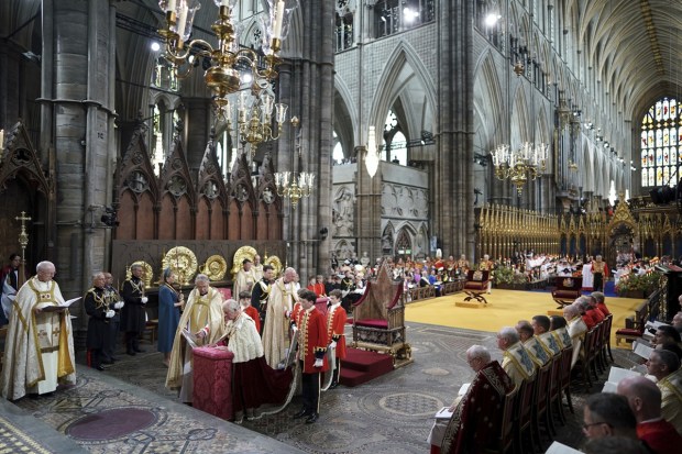 King Charles III kneels during the coronation ceremony at Westminster Abbey, London, Saturday. (Photo: AP)