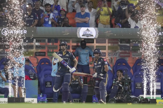 Gujarat Titans player Wriddhiman Saha and Shubman Gill during the IPL 2023 T20 cricket playoff match between Gujarat Titans and Mumbai Indians at the Narendra Modi Stadium in Ahmedabad on Friday. (Photo: PTI)