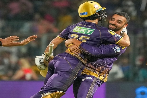Kolkata Knight Riders batter Rinku Singh celebrates with teammate Varun Chakravarthy after winning the IPL 2023 cricket match against Punjab Kings at Eden Gardens in Kolkata Monday. (Photo: PTI)